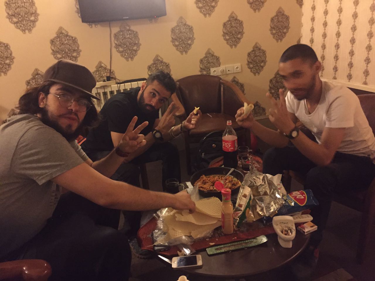 DOP Jay Oza eating kebabs with Tehran rappers in their studio